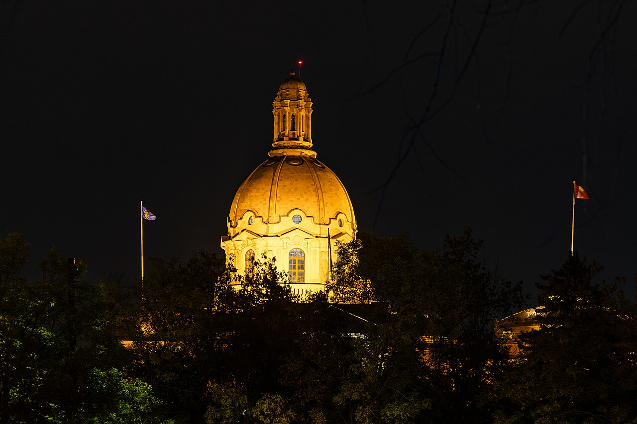 The dome of the Alberta Legislature Building in Edmonton, lit up at night